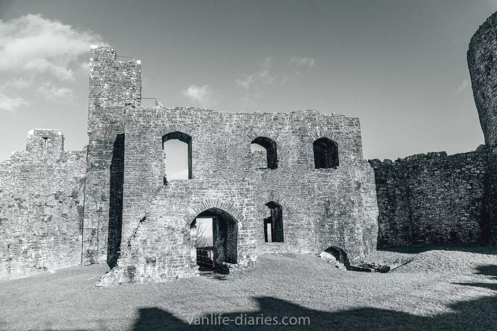 Black and white image showing the ruins of Dinefwr castle