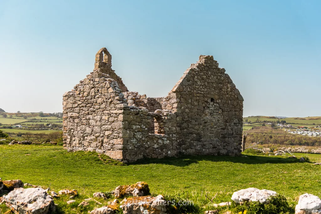 Exterior image of the ruins of Lligwy Chapel on Anglesey, Wales