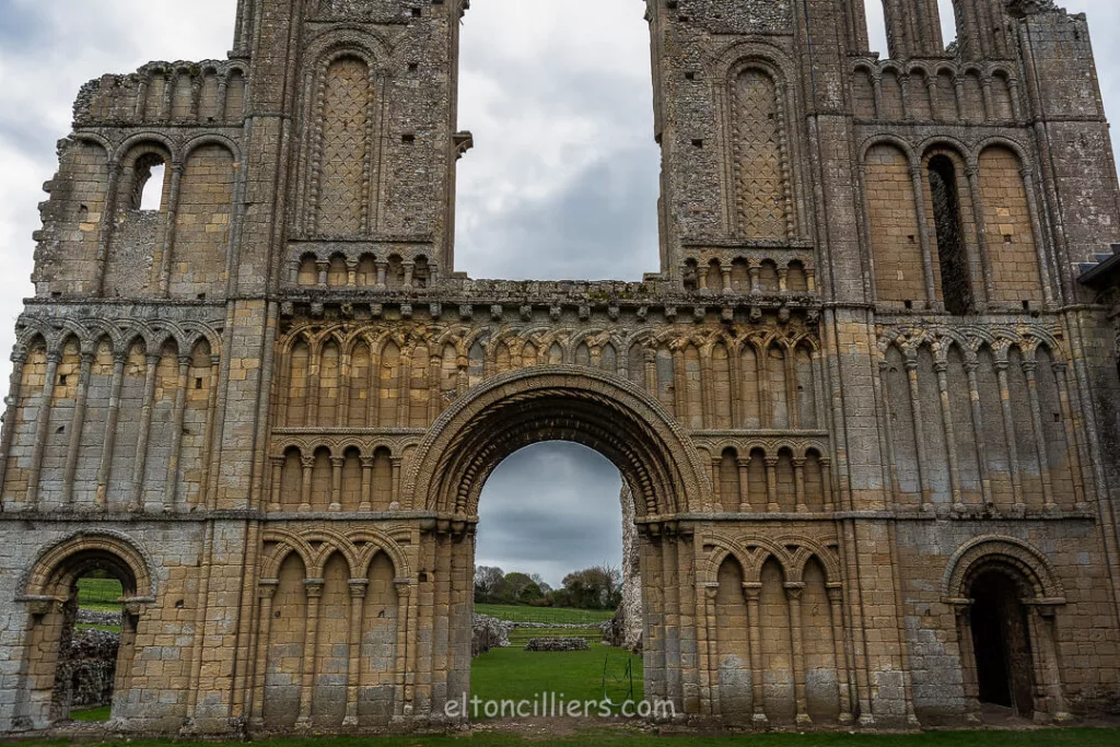 A stunningly carved arch wall with a doorway and window has stood the test of time