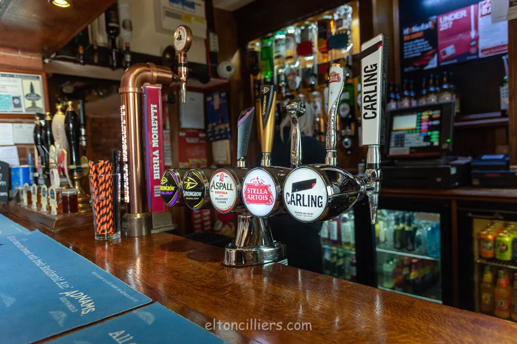 Beer and cider taps in The Carpenters Arms pub in Dale Abbey